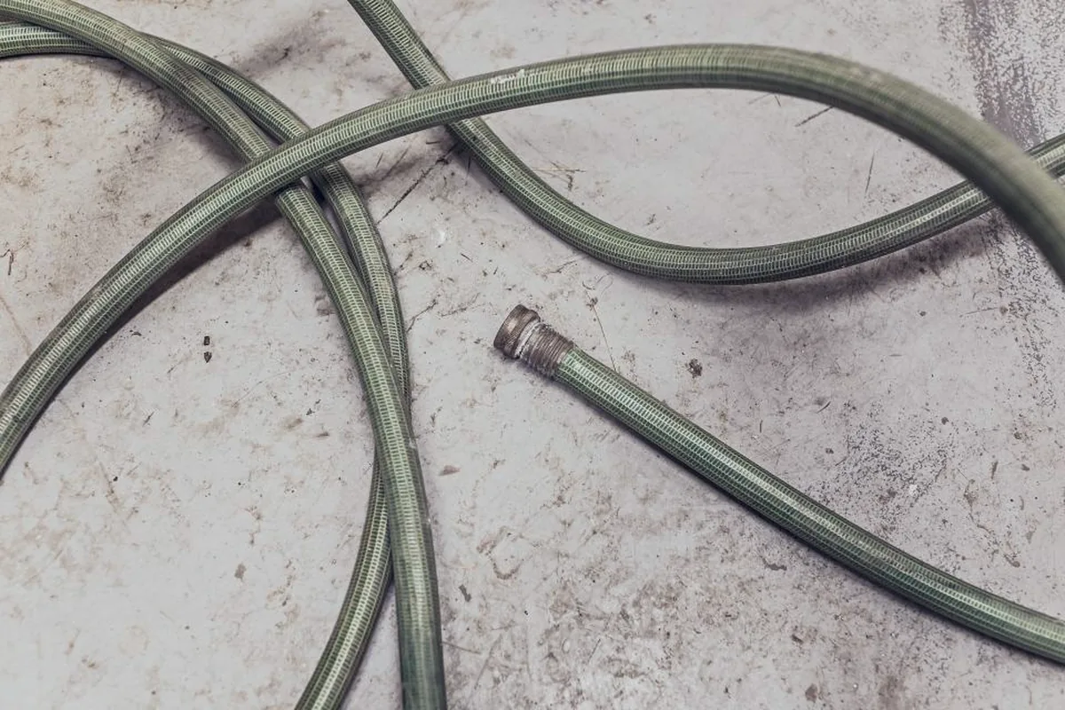 Coiled high-pressure jetting hose ready for a Murrieta service call